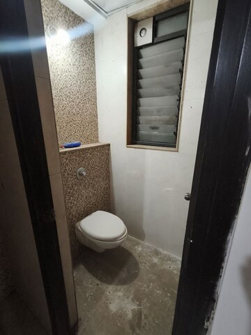 Bathroom in 1 BHK Apartment at Lodha Lakeshore Greens, Dombivli East – for Rent