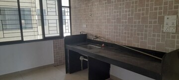 Kitchen in 2 BHK Apartment at Sargam CHS Nanded, Sinhagad Road – for Sale