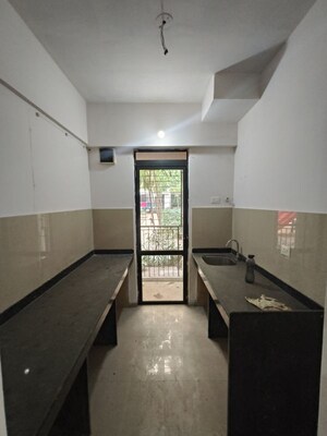 Kitchen in 1 BHK Apartment at Lodha Lakeshore Greens, Dombivli East – for Sale