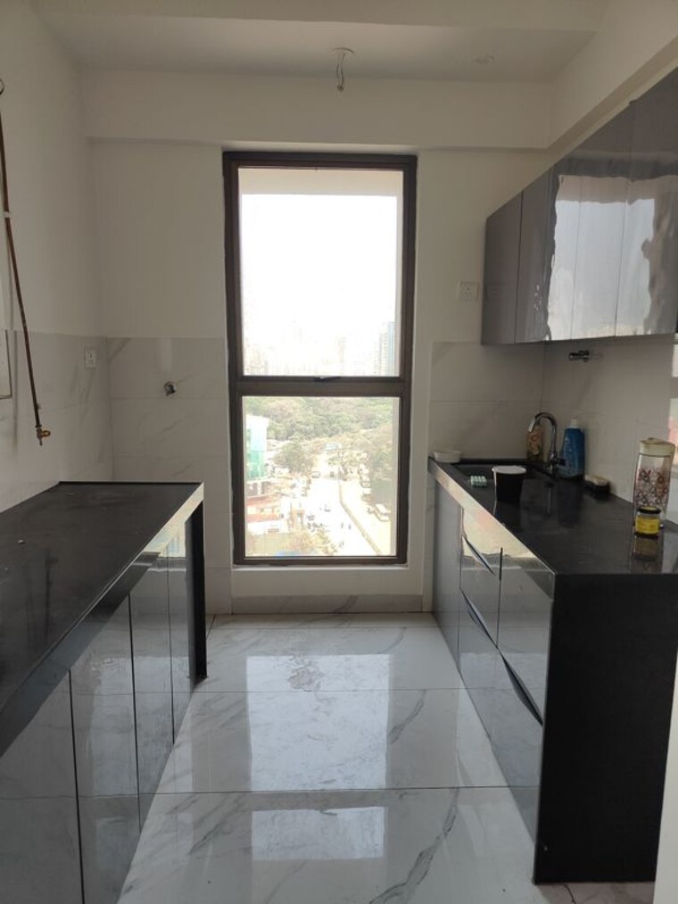 Kitchen, raymond-ten-x-habitat 1 Bedroom 450 Sq.Ft. Apartment In Pokhran Road No Two Thane 9933050