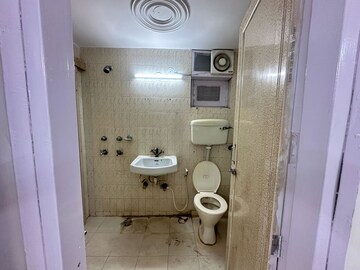 Bathroom in 3 BHK Apartment at Sector 4 Dwarka – for Rent