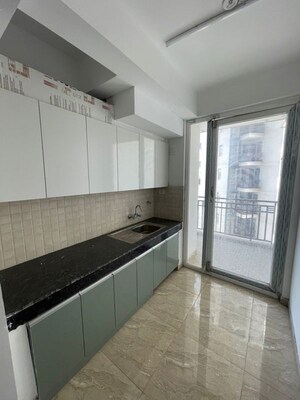 Kitchen in 3 BHK Apartment at SLF Anushree, Sector 75 – for Sale