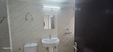 Bathroom in 3 BHK Apartment at Amrapali Heartbeat City, Sector 107 – for Sale