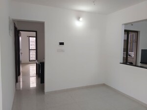 Room in 2 BHK Apartment at Pride World City Wellington, Charholi Budruk – for Rent