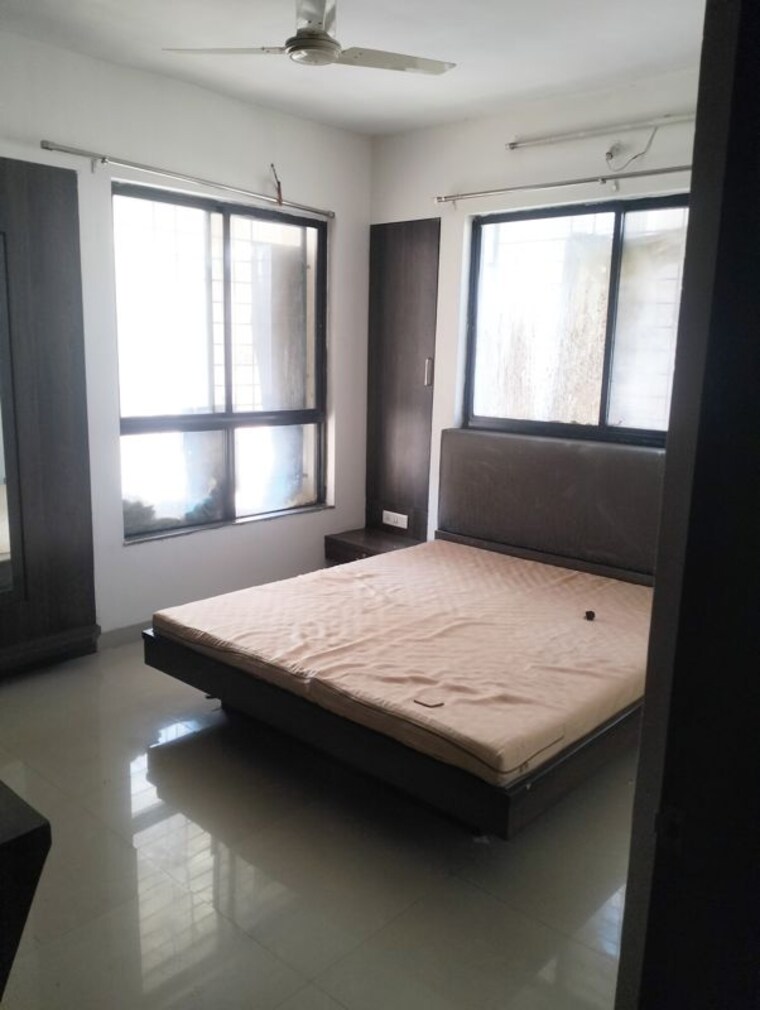 Bedroom, nirmaan-aasamant-phase-i 2 Bedroom 990 Sq.Ft. Apartment In Kondhwa Budruk Pune 9933808