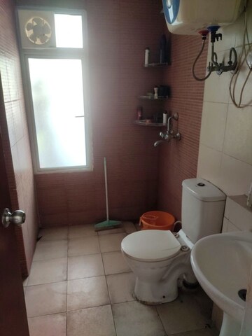 Bathroom in 2 BHK Apartment at Mahagun Mywoods, Sector 16c Greater Noida – for Rent