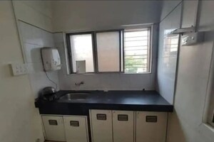 Kitchen in 1 BHK Apartment at Mahalaxmi Racecourse – for Sale
