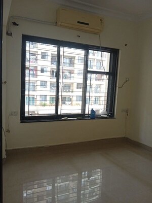 Room in 1 BHK Apartment at K Raheja Raheja Residency, Malad East – for Rent
