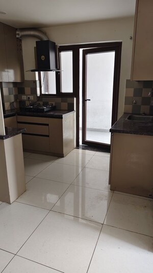 Kitchen in 3 BHK Apartment at Azeagaia Botanica, Vrindavan Yojna – for Sale