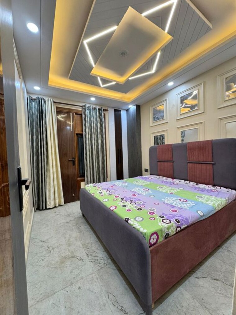 Bedroom, dwarka mor 4 Bedroom 125 Sq.Yd. Builder Floor In Dwarka Mor Delhi 9934409