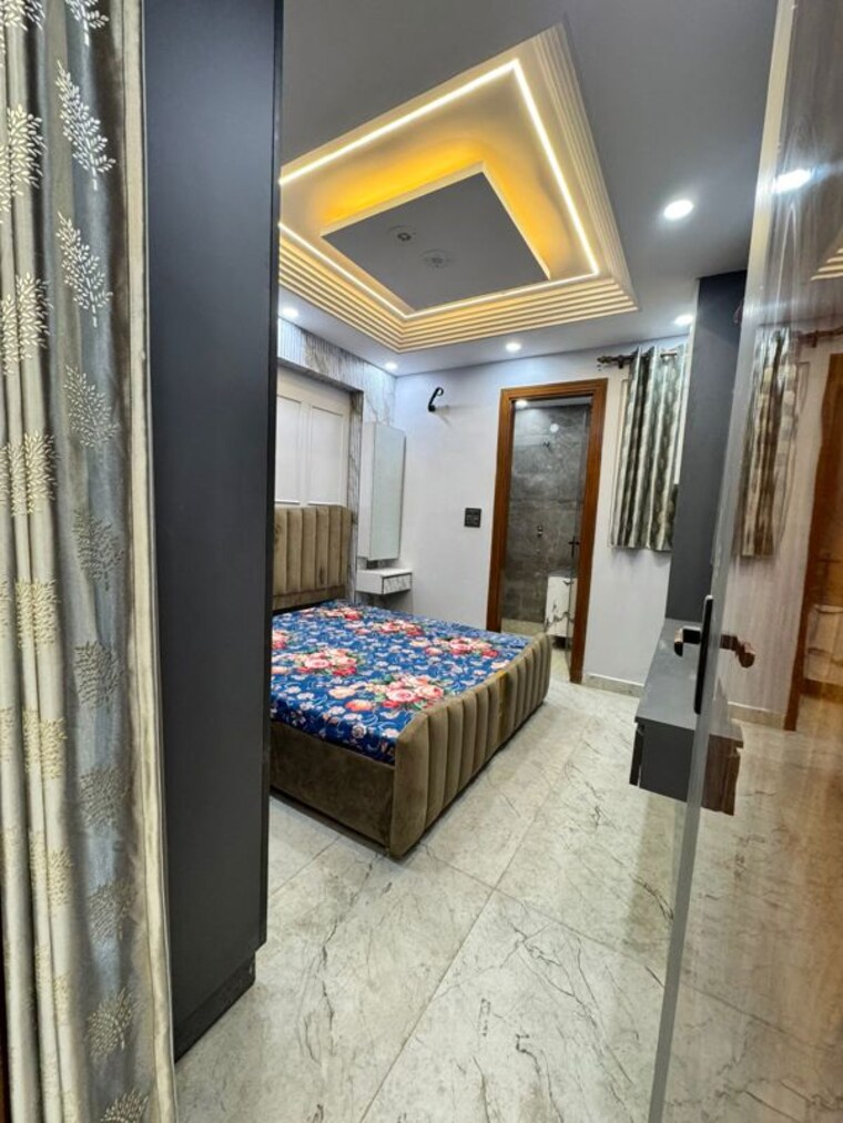 Bedroom, dwarka mor 4 Bedroom 125 Sq.Yd. Builder Floor In Dwarka Mor Delhi 9934409