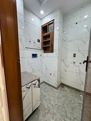 Bathroom in 4 BHK Builder Floor at Dwarka Mor – for Sale