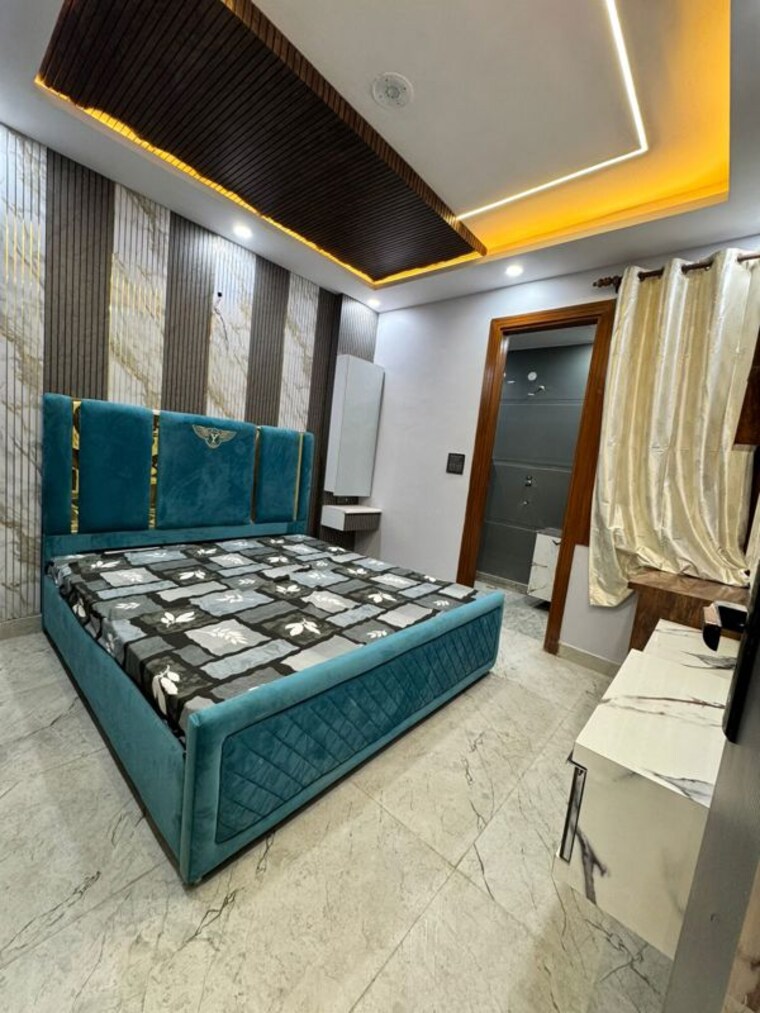 Bedroom, dwarka mor 4 Bedroom 125 Sq.Yd. Builder Floor In Dwarka Mor Delhi 9934409