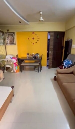 Living Room in 2 BHK Apartment at Raj Estate, Mira Road – for Sale
