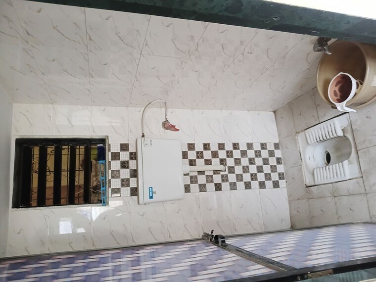 Bathroom, airoli sector 9a 1 Bedroom 550 Sq.Ft. Apartment In Airoli Sector 9a Navi Mumbai 9934681