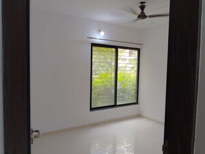 Room in 2 BHK Apartment at Pride World City Brooklyn, Charholi Budruk – for Rent