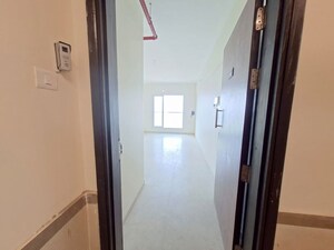 Building Lobby in 2 BHK Apartment at Dosti West County, Balkum Pada – for Rent