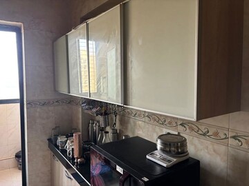 Kitchen in 2 BHK Apartment at K Raheja Heights, Malad East – for Rent