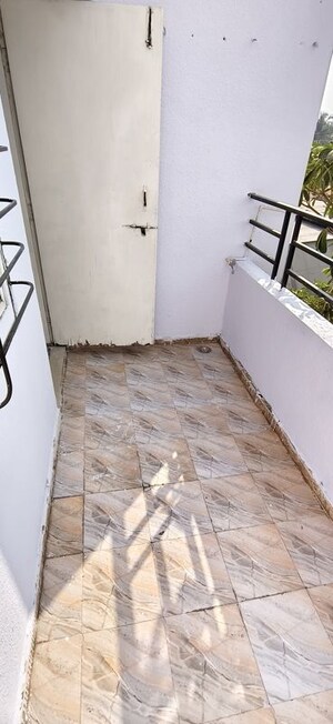 Balcony in 1 BHK Apartment at Wadgaon Sheri – for Rent