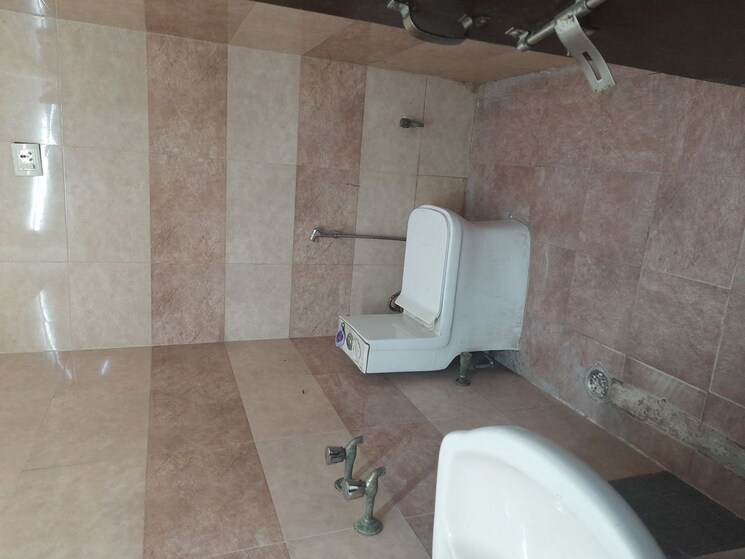 Bathroom, sector 122 1 RK 600 Sq.Ft. Apartment In Sector 122 Noida 9935324