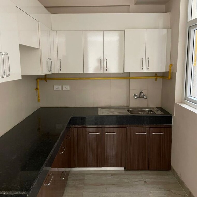 Kitchen, wave-executive-floors 2 Bedroom 900 Sq.Ft. Builder Floor In Bayana Ghaziabad 9935344
