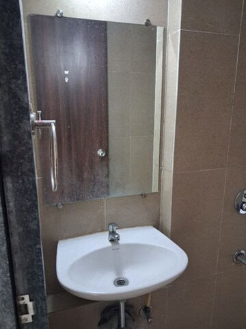 Bathroom in 2 BHK Apartment at Kalpataru Immensa B, Kolshet Road – for Rent