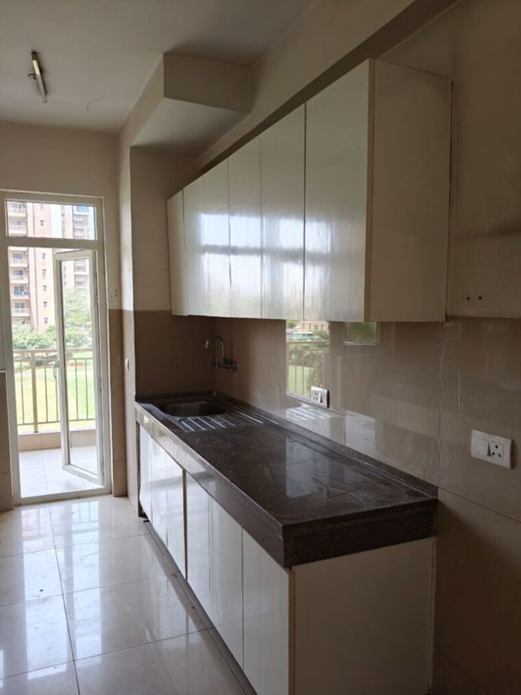 Kitchen, emaar-palm-gardens 3.5 Bedroom 1900 Sq.Ft. Apartment In Sector 83 Gurgaon 9936442