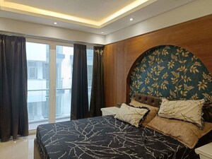 Bedroom in 5 BHK Apartment at Mahagun Marvella, Sector 78 – for Rent