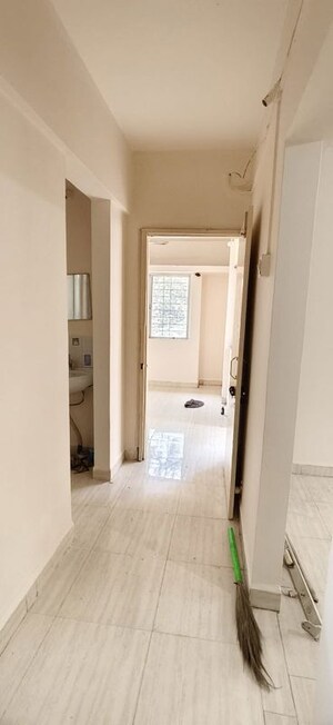 Building Lobby in 1 BHK Apartment at Wadgaon Sheri – for Rent