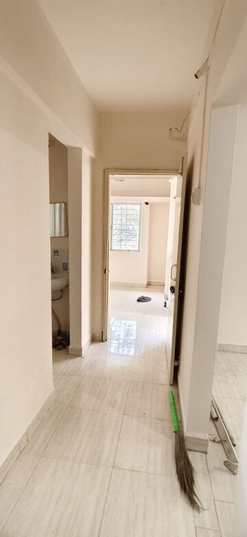 Building Lobby in 1 BHK Apartment at Wadgaon Sheri – for Rent