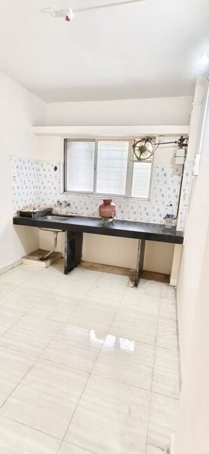Kitchen in 1 BHK Apartment at Wadgaon Sheri – for Rent