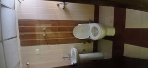 Bathroom in 3 BHK Apartment at Meenal Balmukund Residency, Raj Nagar Extension – for Sale