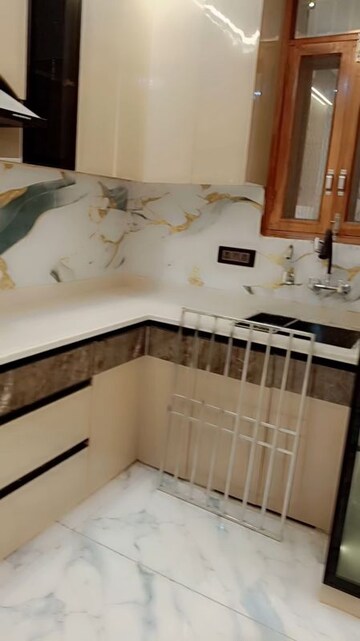 Kitchen in 4 BHK Builder Floor at Shalimar Garden Extension I – for Sale