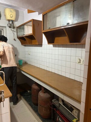 Kitchen in 2 BHK Apartment at Rail Vihar Apartment, Sector 15 – for Rent