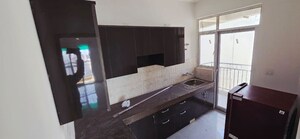 Kitchen in 2 BHK Apartment at ATS Allure, Sector 22d Yamuna Expressway – for Rent