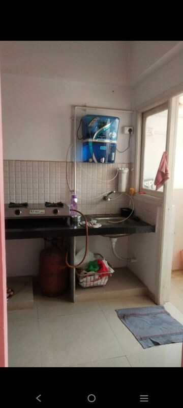 Kitchen in 1 BHK Apartment at Applewood Satyesh Residency, Shela – for Rent