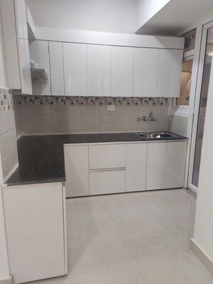 Kitchen in 2 BHK Apartment at Signature Global Orchard Avenue, Sector 93 – for Sale