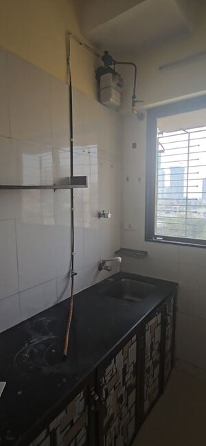 Kitchen in 1 BHK Apartment at Rohan Mirage, Matunga West – for Rent