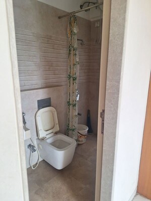 Bathroom in 1 BHK Apartment at Prime Pride Heights, Andheri West – for Rent