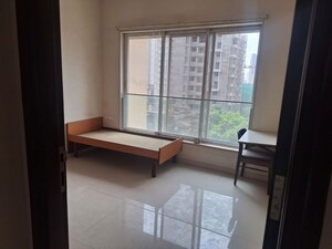 Living Room in 1 BHK Apartment at Prime Pride Heights, Andheri West – for Rent