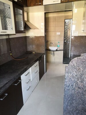 Kitchen in 2 BHK Apartment at Magnolia Enclave, Powai – for Rent