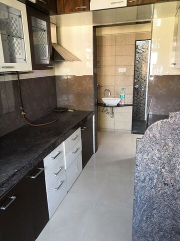 Kitchen in 2 BHK Apartment at Magnolia Enclave, Powai – for Rent