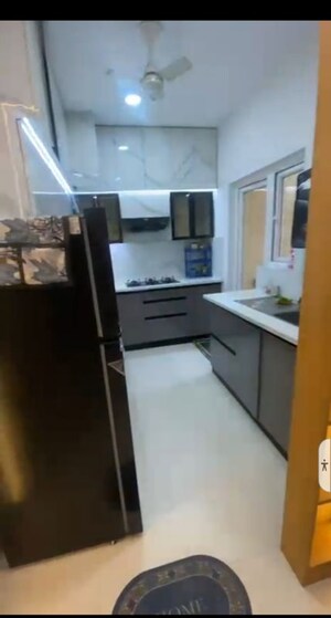 Kitchen in 3 BHK Apartment at Pardos Okas Residency, Sushant Golf City – for Rent