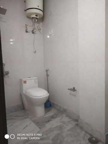 Bathroom in 2 BHK Builder Floor at Khirki Extension – for Sale