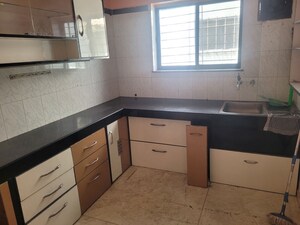 Kitchen in 2 BHK Apartment at Angal Utkarsha, Model Colony – for Rent