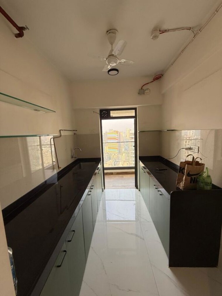 Kitchen, level-the-residences 2 Bedroom 750 Sq.Ft. Apartment In Andheri West Mumbai 9937742