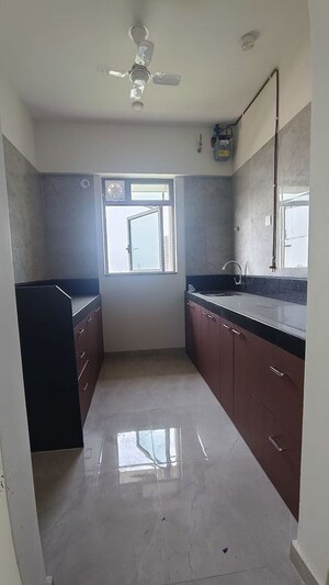 Kitchen in 1 BHK Apartment at Sheth Irene, Malad West – for Rent