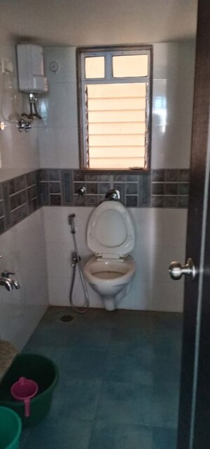 Bathroom in 3 BHK Apartment at Dhoot Sky Residency New Sonali CHSL, Malad West – for Rent