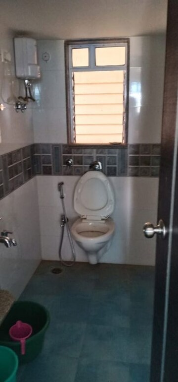 Bathroom in 3 BHK Apartment at Dhoot Sky Residency New Sonali CHSL, Malad West – for Rent
