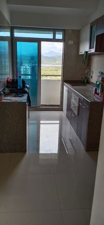 Kitchen in 3 BHK Apartment at Dhoot Sky Residency New Sonali CHSL, Malad West – for Rent